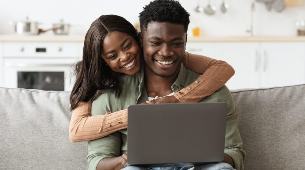 Closeup of african american family using computer at home